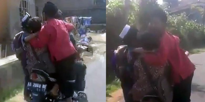Seorang pengendara sepeda motor membonceng empat orang seperti sirkus, tiga di antara adalah anak kecil.