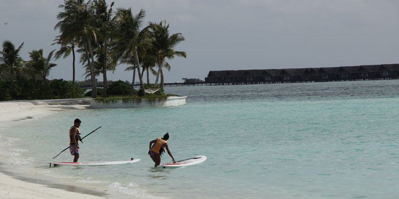 Wisatawan di Club Med Finolhu Villas, Maladewa, Senin (17/7/2017).