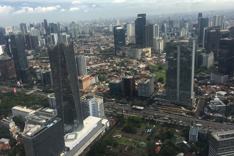 Pemandangan kota Jakarta dari ketinggian saat menggunakan transportasi helikopter, Jumat (22/12/2017).