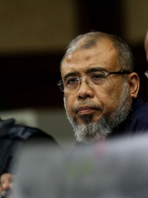 Mantan Hakim Konstitusi, Patrialis Akbar saat menjalani sidang di Pengadilan Tipikor, Jakarta Pusat, Senin (24/7/2017). Patrialis didakwa menerima suap dari pengusaha impor daging, Basuki Hariman. Suap tersebut diduga untuk memengaruhi putusan uji materi yang diajukan ke Mahkamah Konstitusi.