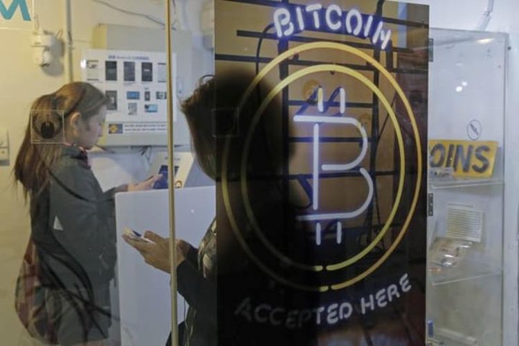 Ilustrasi Bitcon. (AP via The Guardian)