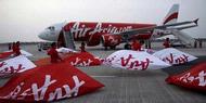 Laba Bersih AirAsia 2011 Jatuh Hampir Setengahnya
