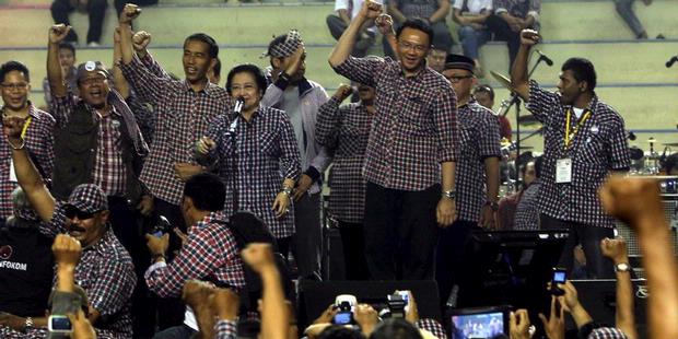 Giliran Tim Jokowi-Basuki Laporkan Foke-Nara