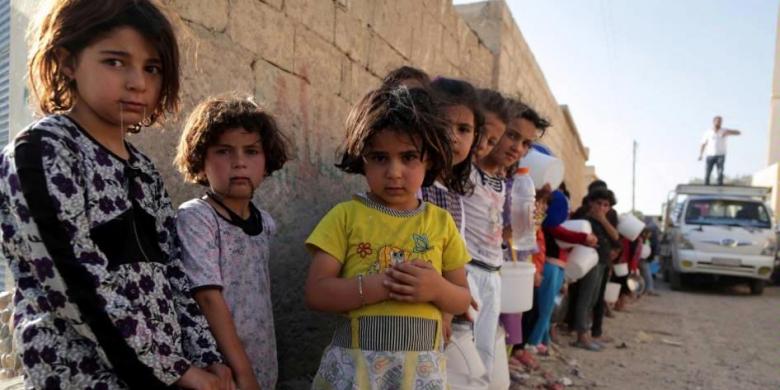 Anak Suriah Sumber gambar : internasional.kompas.com (AFP PHOTO / MEZAR MATAR )
