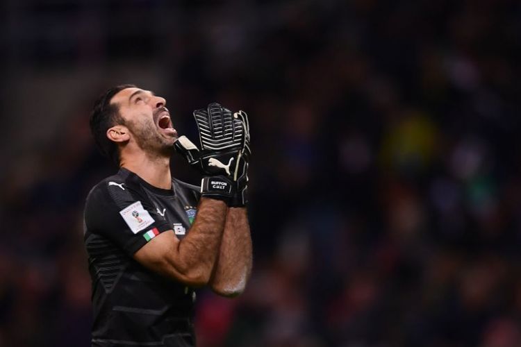 Italys goalkeeper Gianluigi Buffon reacts during the FIFA World Cup 2018 qualification football match between Italy and Sweden, on November 13, 2017 at the San Siro stadium in Milan. / AFP PHOTO / Marco BERTORELLO (Photo credit should read MARCO BERTORELLO/AFP/Getty Images)