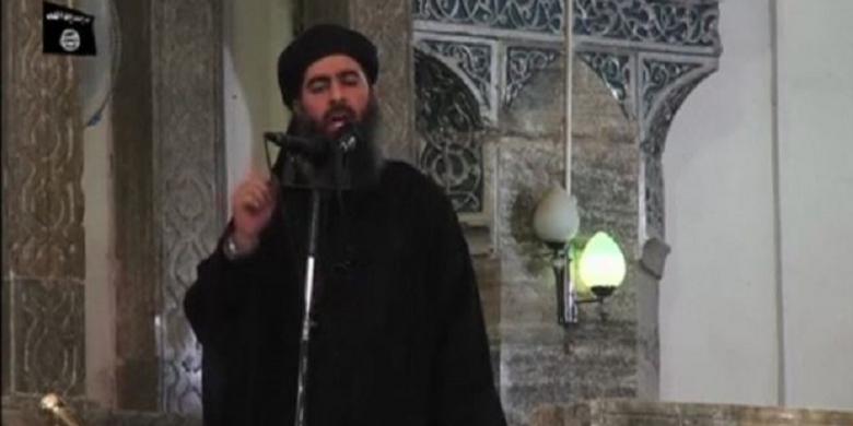 Pemimpin ISIS, Abu Bakr al-Baghdadi di sebuah masjid di kota Mosul, Irak, 5 Juli 2014| Reuters